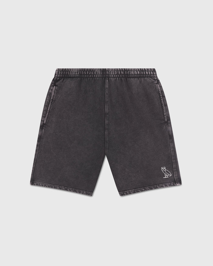 Black garment-dyed shorts with elasticized waistband and small owl logo on right leg.
