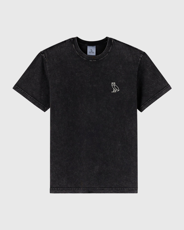 Black garment-dyed t-shirt with small white owl embroidery on chest.