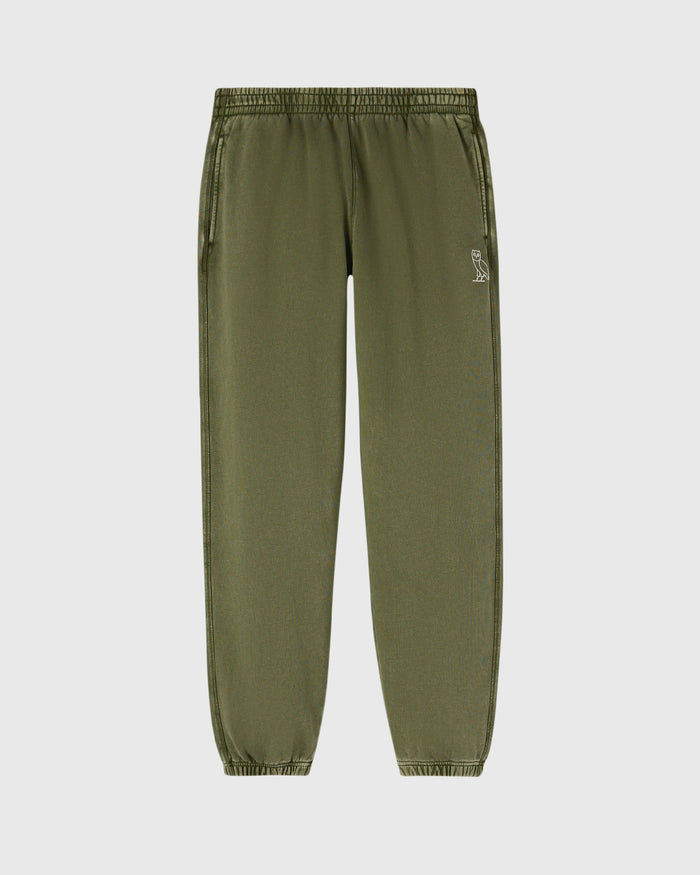 Cypress green sweatpant with elastic waistband, drawstring, side pockets, and small logo embroidered on thigh.