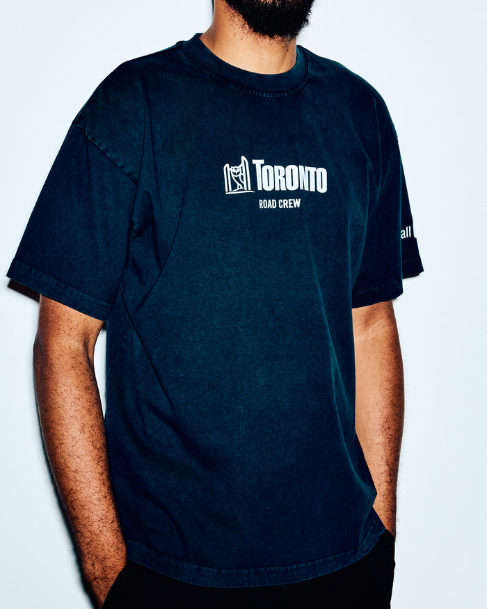 Navy crewneck tee with white "Toronto Road Crew" text and logo graphic on chest.
