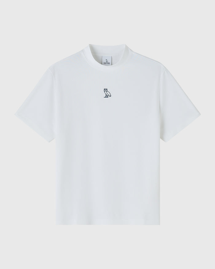 White short-sleeve mockneck tee with small owl logo embroidered on chest.