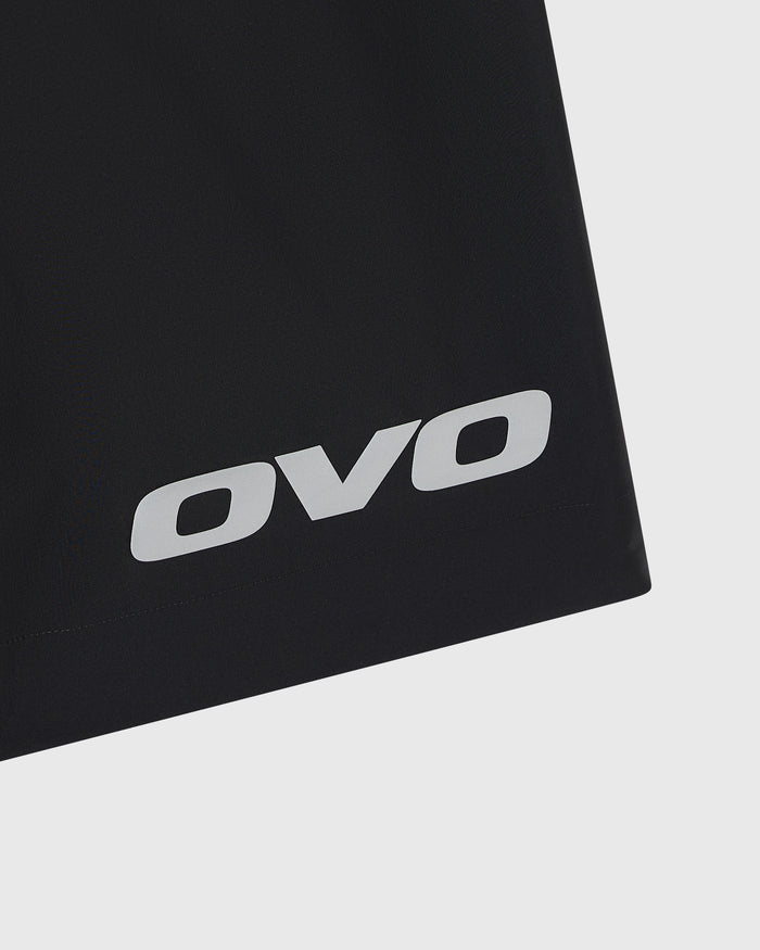 Black golf short with white OVO logo on leg.
