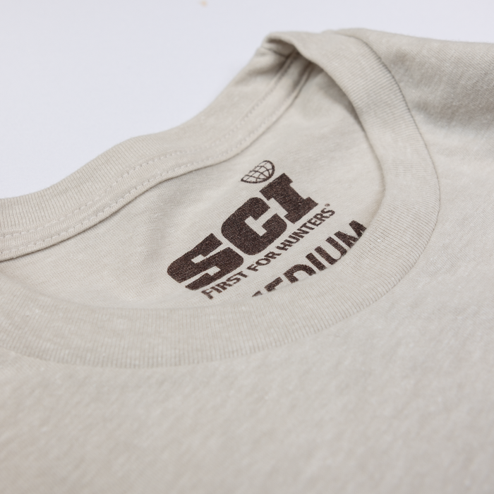 closeup of neckline of shirt showing SCI logo