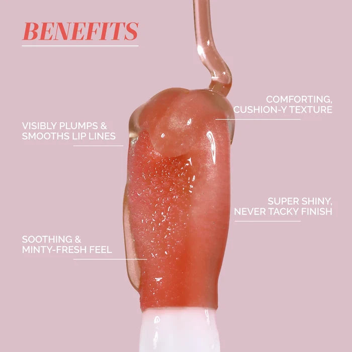 Close-up of LONDONTOWN Quench Glow Buttery Lip Oil – Honeyed: plumps lips, smooths lines, cushiony texture, plush shine, soothing minty feel, and a wash of hydrating color with a shiny finish.