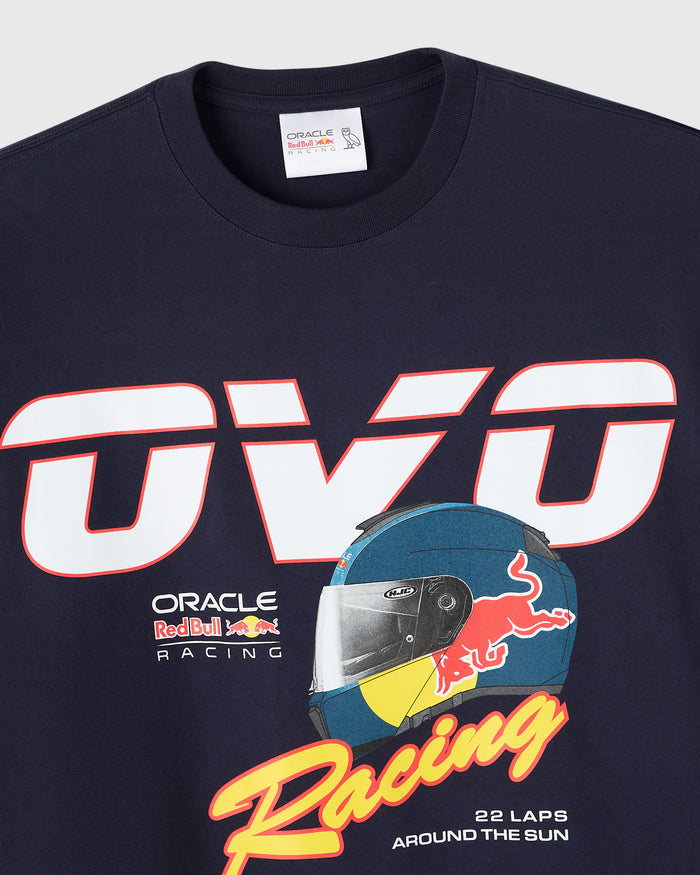 Navy crew neck tee with white and red "RB7" graphic, racing helmet, and Red Bull Racing branding.