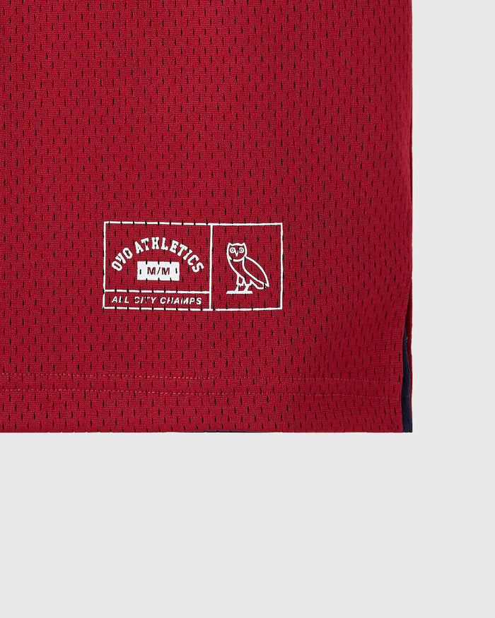Deep red mesh basketball jersey with white embroidered "OHO Athletics" logo and owl graphic on front.