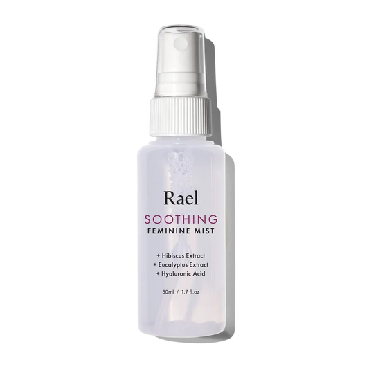 A travel-sized bottle of Rael Soothing Feminine Mist with a white spray nozzle. The label includes the product name and key botanical ingredients such as Hibiscus Extract, Eucalyptus Extract, and Hyaluronic Acid.