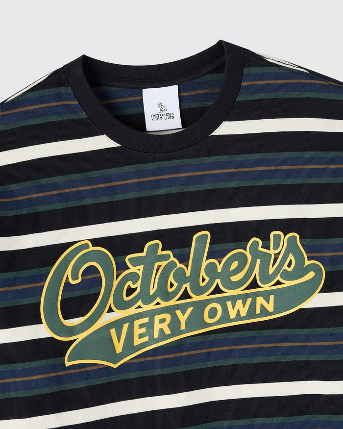 Black long-sleeve tee with multi-colored horizontal stripes and yellow "Oddballs Very Own" script graphic on chest.