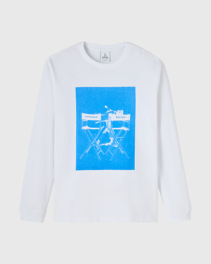 White long-sleeve tee with blue graphic print featuring abstract line art and text on chest.