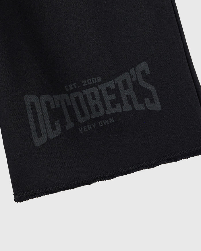 Black sweatshort with "Est. 2008 Outdoors Very Own" text printed on leg.