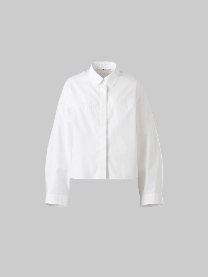 Uniqlo cotton cocoon shirt in size XL, new with tags, featuring a relaxed fit and soft cotton fabric.