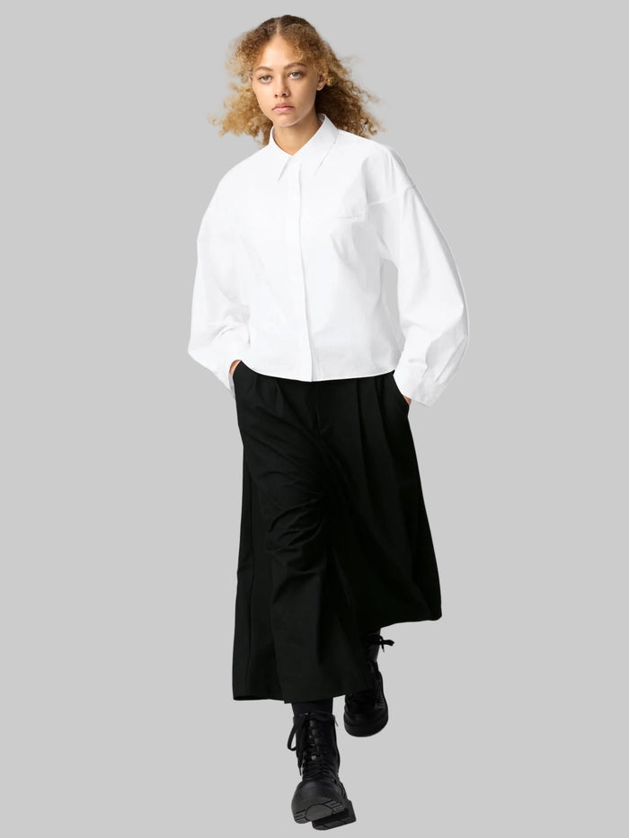 Uniqlo cotton cocoon shirt in size XL, displayed flat with button details and relaxed fit, new with tags.