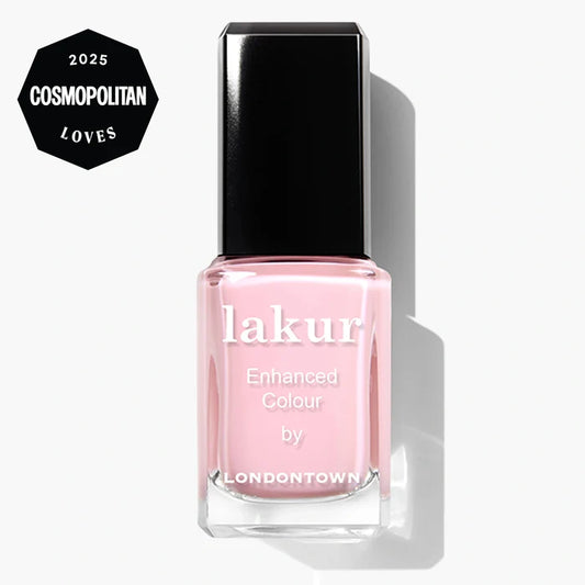 A bottle of LONDONTOWN Waterloo Sunset vegan, cruelty-free nail polish in light pink, featuring a 2025 Cosmopolitan Loves award badge in the top left corner.